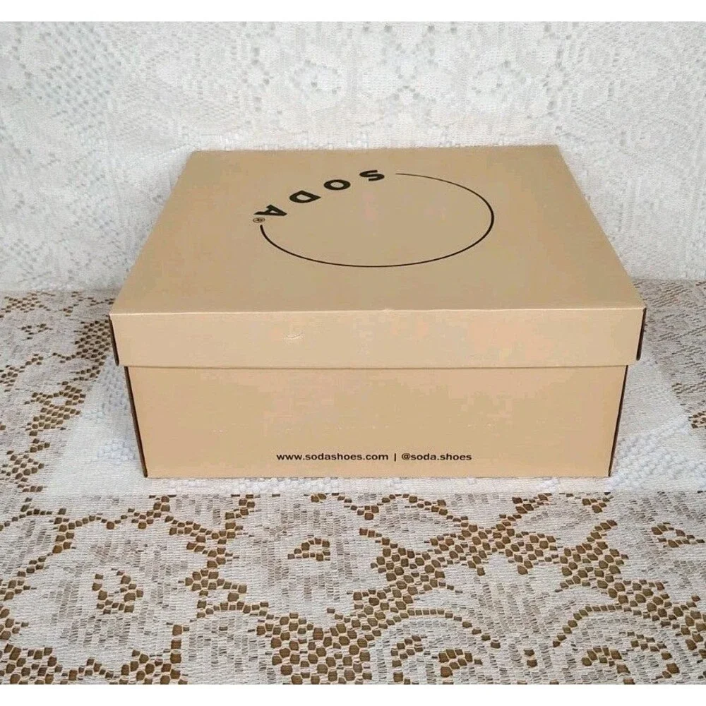 Empty shoe box from Soda with Styrofoam Shoe Inserts